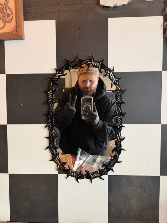 Barbed Mirror